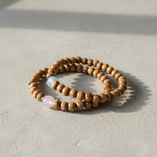 Wooden beaded bracelet on a neutral background